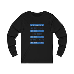 WE BUY THE THINGS WE DON'T NEED...Unisex Jersey Long Sleeve Tee